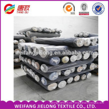 Un grado de alta calidad Stock Denim Fabric Hilado de algodón teñido Indigo Denim Fabric for jeans Vestido y camisa